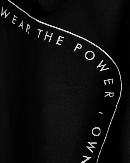 Zor Black Hoodie, Hoodies for Men, Hoodies for Women, Black hoodie with white embroidery text 'Wear the Power, Own the Look' on a black back